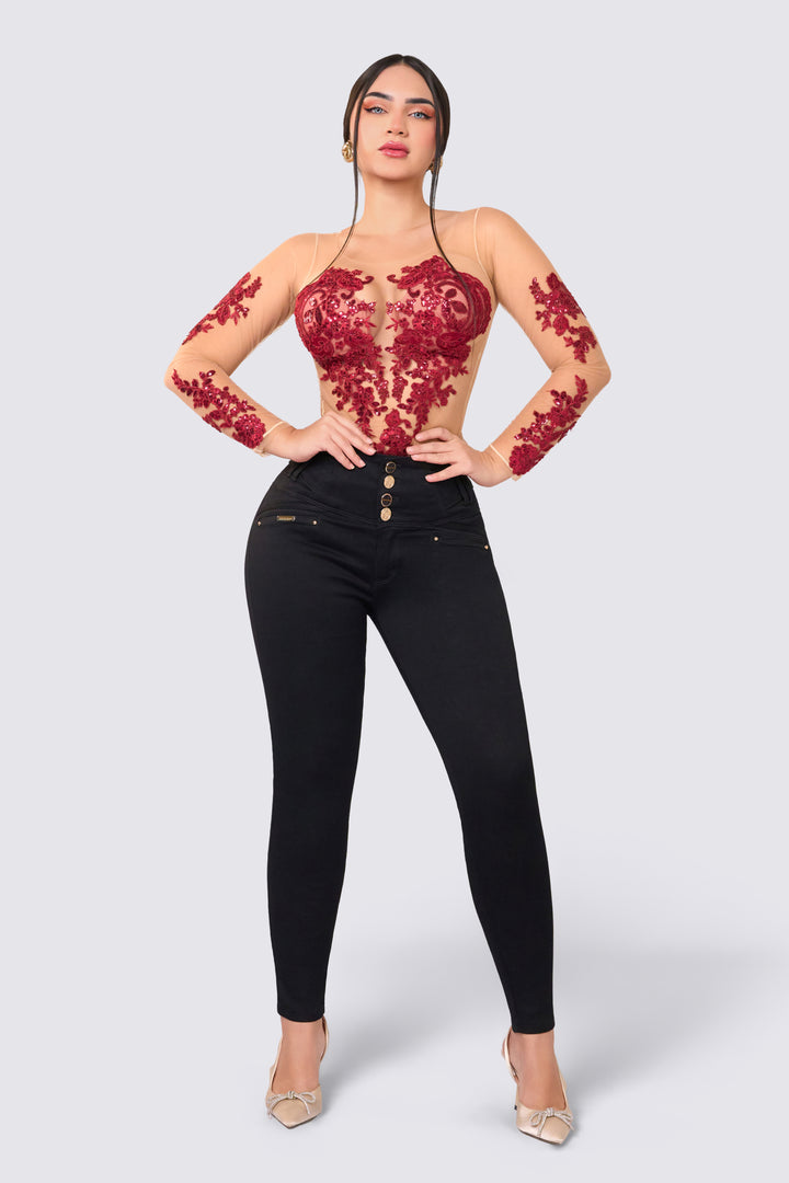 Black skinny jeans with a wide waistband, high rise, perfect fit, and elastic. 