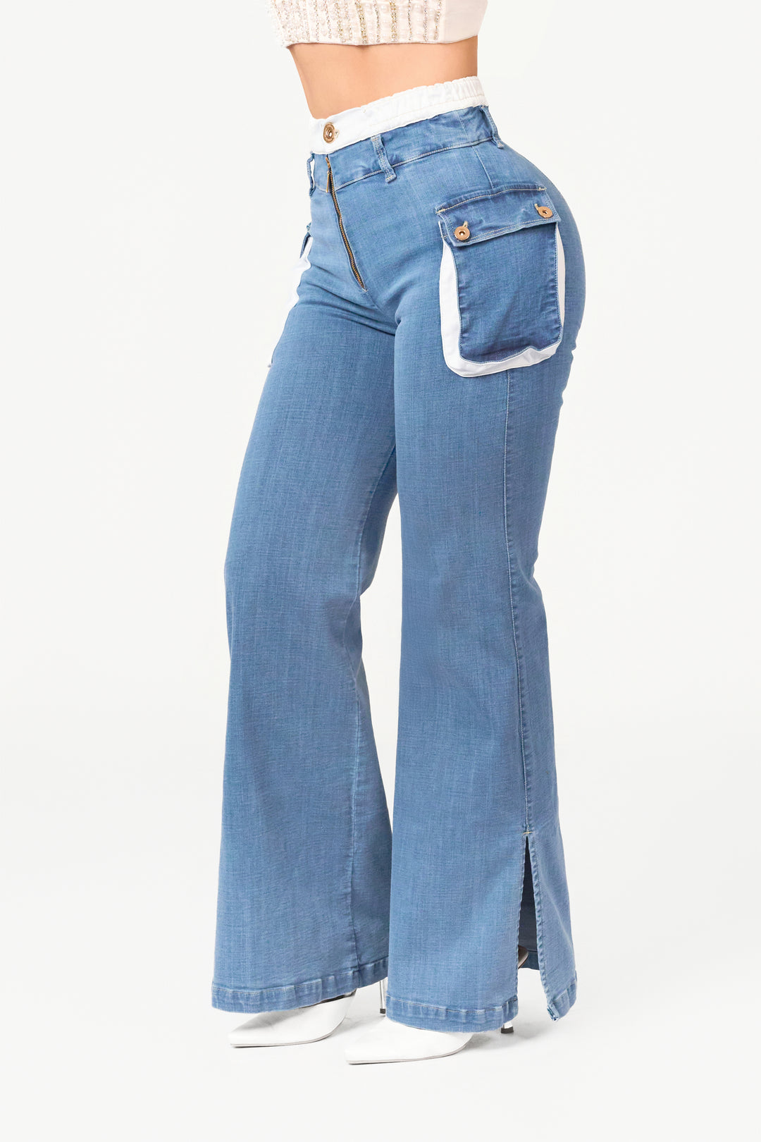 Straight-leg pants with side slits, light blue color, and cargo-style side pockets.