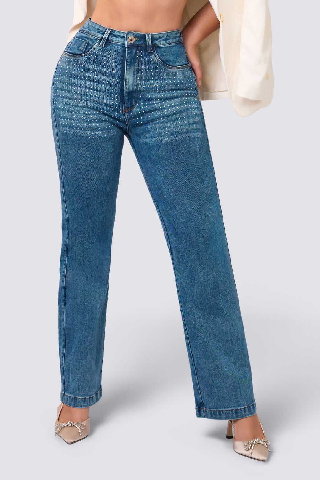 Straight-leg pants with a high rise, slim waistband with a single button, and elegant rhinestone detailing. 
