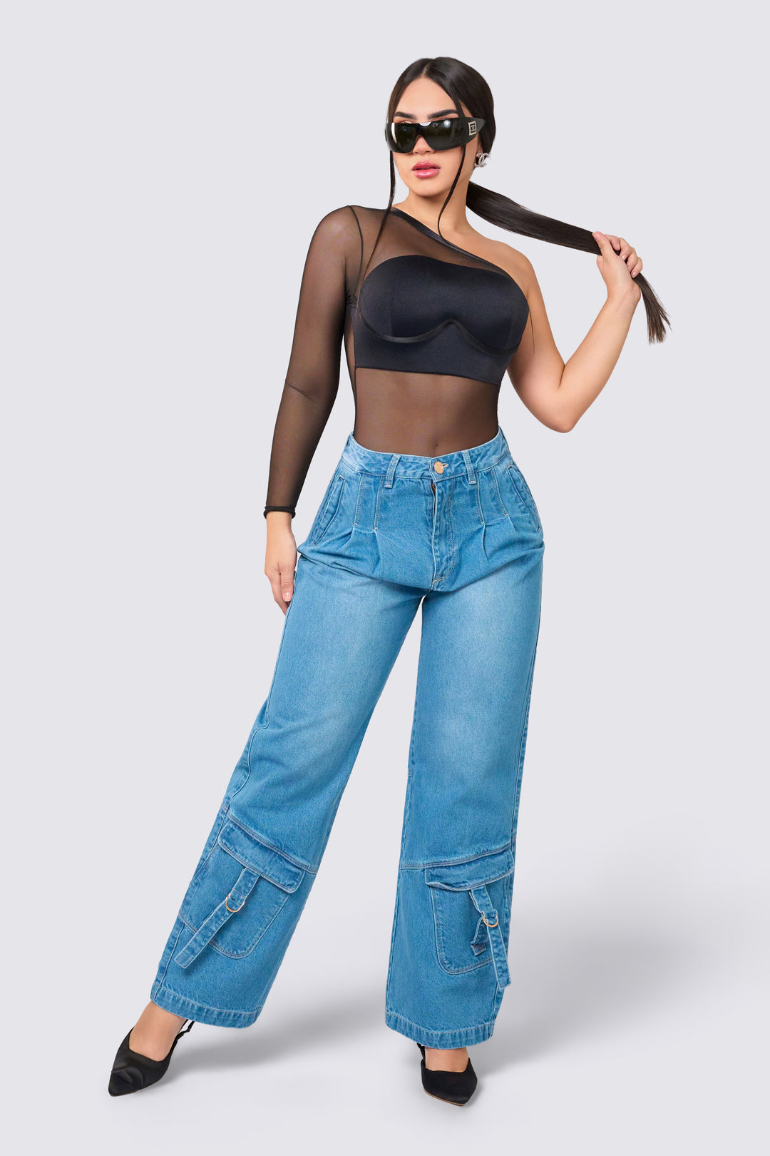 Blue wide-leg jeans, mid-rise, loose fit, and back pockets.