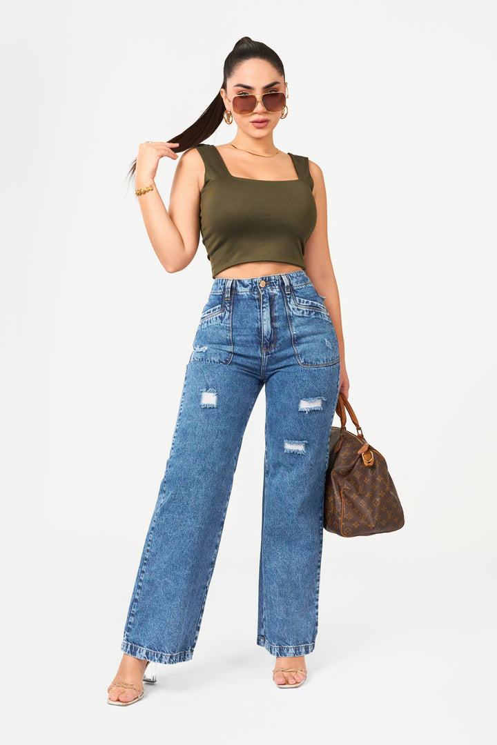 Blue wide-leg pants with a thin waistband with a single button and distressed detailing on the front. 