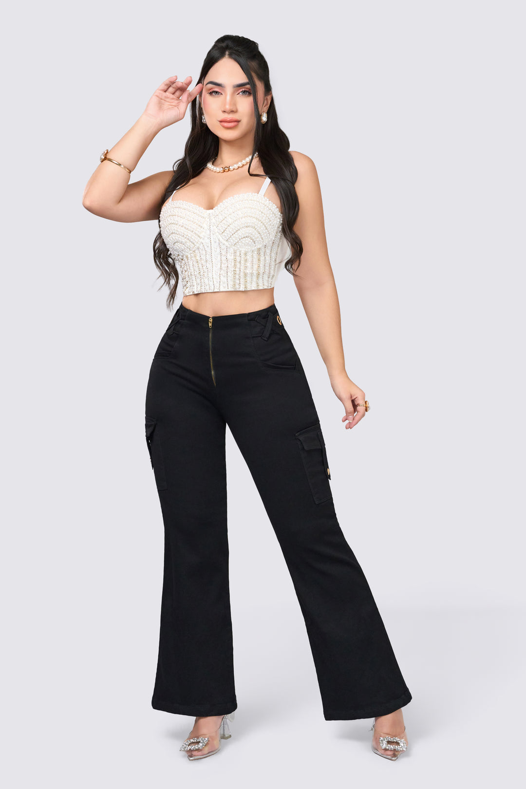 Black pants, bell-bottom, high-waisted, and push-up effect.