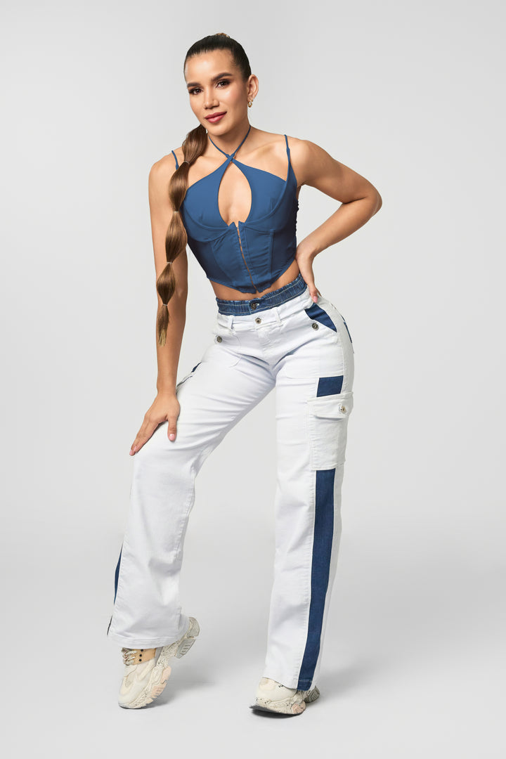 High-rise white cargo jeans with blue denim details and elastic waistband. A bold streetwear look with shaping fit.