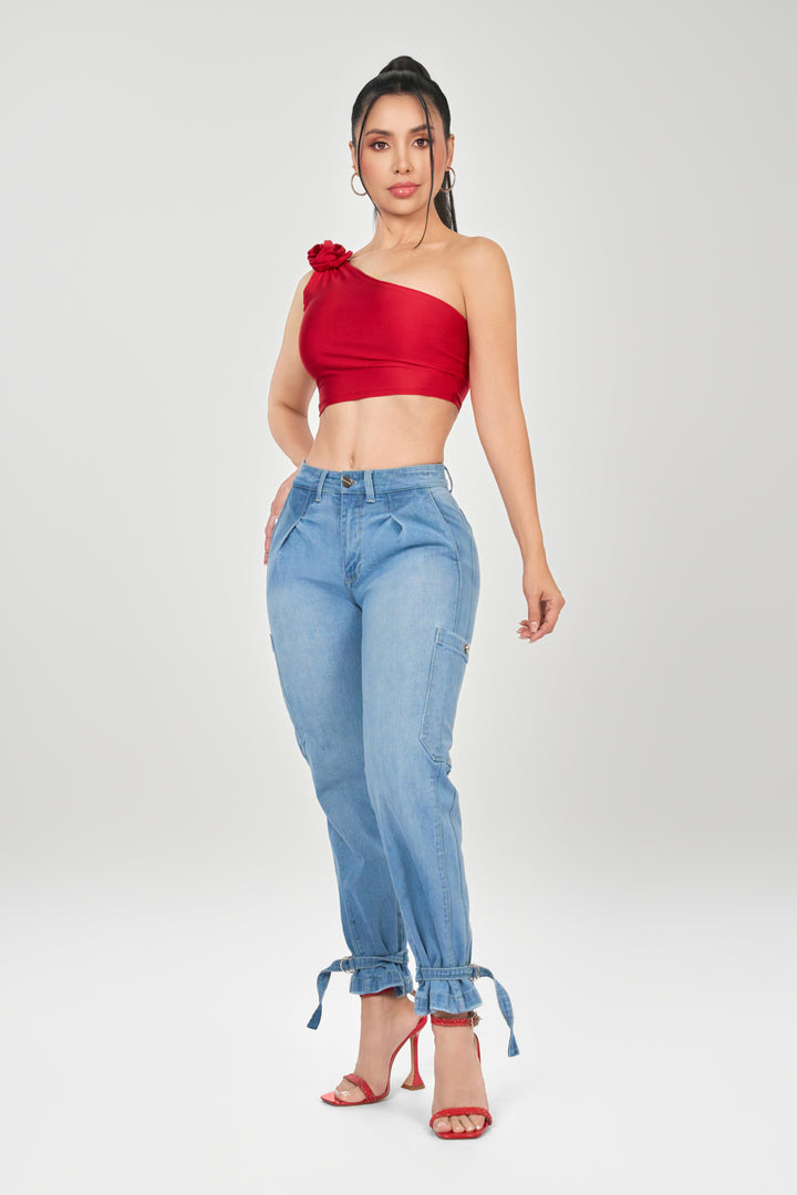 Light blue denim pants with a mid-rise, relaxed and soft style with a custom fit at the boot.