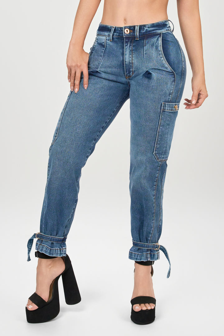 Blue pants with custom fit at the bootleg and a slim waistband with a single button.