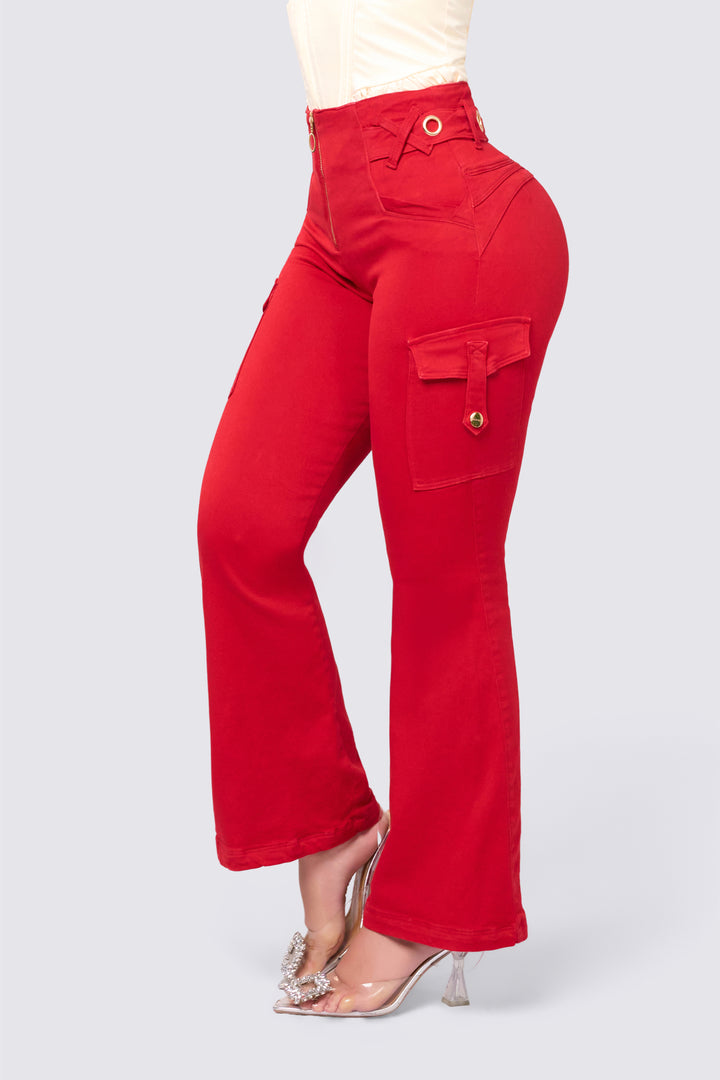 High-waisted red jeans with flared legs and cargo-style pockets on the sides. 