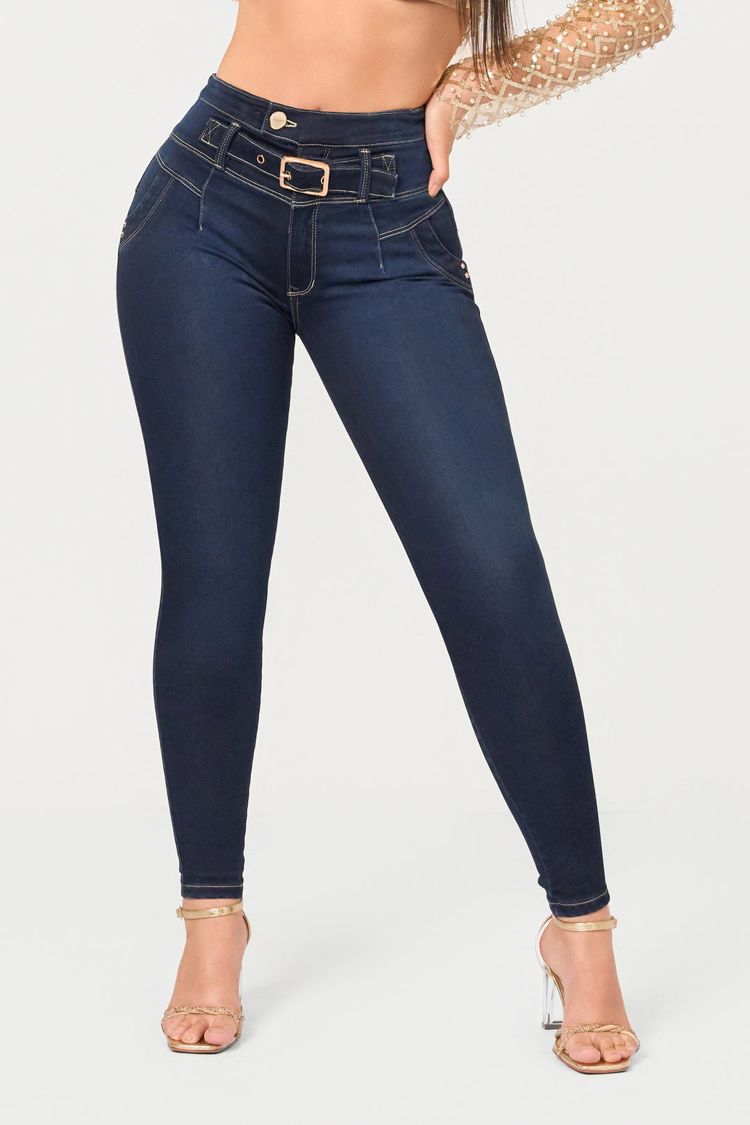 Dark blue skinny jeans with adjustable denim belt, high rise, and perfect fit.