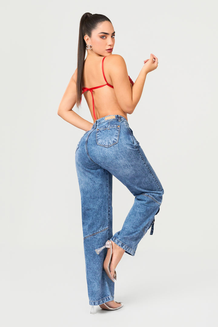 Women’s blue cargo wide leg jeans. High-rise fit with large pockets for a bold and functional denim look.