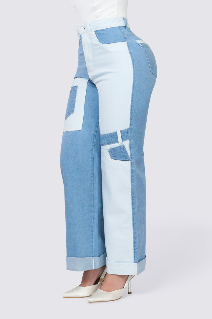 Wide leg jeans in light blue and white.
